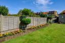 What is the maximum height of a garden fence in the UK?
