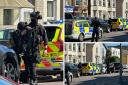 Heavily armed police approached a vehicle parked on Ashley Road in Boscombe in connection with alleged traffic offences.