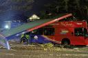 Passenger injured after bus collides with tree and tears off roof