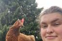 Jade Cooper with Wonka the hen. Release date - December 13 2023. See SWNS story SWLNchicken. Meet the famous chicken with a wonky beak - who was rescued from death's doors at a commercial egg farm. Wonka the hen has captured the hearts of meat-eaters