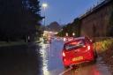 Traffic chaos as road blocked by flooding