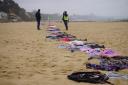 Led By Donkeys created a 5km line of children's clothes to represent children killed in the Israel-Gaze conflict.