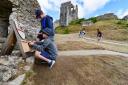 Children enjoying a quest at Corfe Castle
