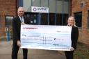 Dorset Police and Crime Commissioner David Sidwick presenting check to Sharon Ellis Gillard from Safempowerment