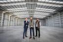 Beyond Retail Founder and managing Director Elliot Lees-Bell (centre) with Director of Warehouse Operations Jim Younger (right), and Mike Murray, Commercial Real Estate Director for Rigby Real Estate (left), inside the new warehouse unit.