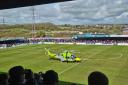 The air ambulance landing at the Bob Lucas Stadium in Weymouth