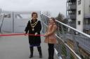 Mayor of Poole, Cllr Ann Stribley, cutting the ribbon with Elizabeth Potter.