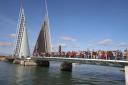 Poole residents take the opportunity of walking on the new Twin Sails bridge during the community weekend.