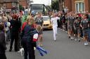 REALISING A DREAM: Nathan Bailey carried the Olympic torch through Boscombe ahead of London 2012. Now, he's heading to Rio.