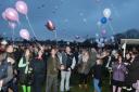 Family and friends of Jade Clark release balloons in tribute