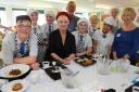 FOODIES: Students from The Grange School take part in the semi-finals of the Christchurch Food Festival competition, with judging chef Lesley Waters in the red beret