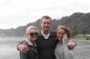 HAPPIER DAYS: Mark Longley with his daughters Emily, left and sister Hannah