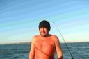 IT'S A BIT NIPPY: Mark Hilliard at sea in his lobster thong