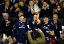 Scotland’s Finn Russell (left) and Rory Darge lift the Calcutta Cup aloft after victory over England (Andrew Milligan/PA)