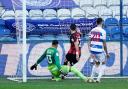 AFC Bournemouth's Shane Long scores their first goal of the game during the Sky Bet Championship match at the Kiyan Prince Foundation Stadium, London. Picture date: Saturday February 20, 2021. PA Photo. See PA story SOCCER QPR. Photo credit should