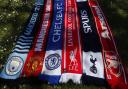 A selection of scarves of the English soccer Premier League teams who are reported to be part of a proposed European Super League, laid out and photographed, in London, Monday, April 19, 2021.  The 12 European clubs planning to start a breakaway Super