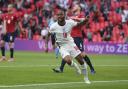 England's Raheem Sterling celebrates after scoring his side's opening goal during the Euro 2020 soccer championship group D match between Czech Republic and England, at Wembley stadium in London, Tuesday, June 22, 2021. (AP Photo/Laurence