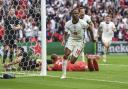 England's Raheem Sterling celebrates after scoring his side's opening goal during the Euro 2020 soccer championship round of 16 match between England and Germany, at Wembley stadium in London, Tuesday, June 29, 2021. (Andy Rain, Pool via AP).