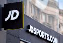 A shop sign for JD Sports in central London. Credit:PA