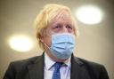 Prime Minister Boris Johnson wearing a mask.  Credit: PA