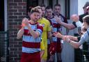 Lee Francis leads out his side for the last time in the Wessex League (Pic: Shaun Lee / SLR Photography)