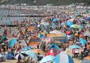 Find a quieter spot in Bournemouth, Christchurch and Poole with the Beach Check app. Picture: PA