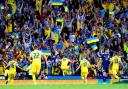 Ukraine's Roman Yaremchuk (centre) celebrates in front of the fans after scoring their side's second goal of the game during the FIFA World Cup 2022 Qualifier play-off semi-final match at Hampden Park, Glasgow. Picture date: Wednesday June 1,