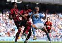 Bournemouth's Lloyd Kelly, Jefferson Lerma and Manchester City's Erling Haaland battle for the ball during the Premier League match at the Etihad Stadium, Manchester. Pic: PA Images