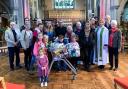 Vicar, Michael Smith and The Dean of Winchester, Catherine Ogle (who was leading the service) together with some members of the congregation and food collect