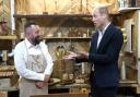 The Prince of Wales during a visit to Faithworks Carpentry Workshop
