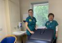 Lenka and Kay from Complementary Therapies team with the chair-bed.