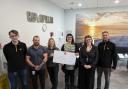 Cheque presentation to Lexi May Trust