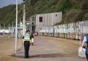 Murder probe enters fifth day after woman stabbed on beach - updates