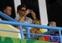 TAKE YOUR SEATS: There are seats aplenty for the affluent fans of Australia, New Zealand and England  and even for royal visitors such as Prince Harry, pictured above taking a quick snap while watching England against Australia at the Sir Vivian Richards
