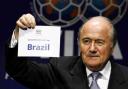 AND THE HOST NATION IS... :  FIFA President Sepp Blatter announced this week that Brazil will host the 2014 Soccer World Cup. However, in four years' time the FA will be hoping that it will be England's name that will be drawn out to host the 2018