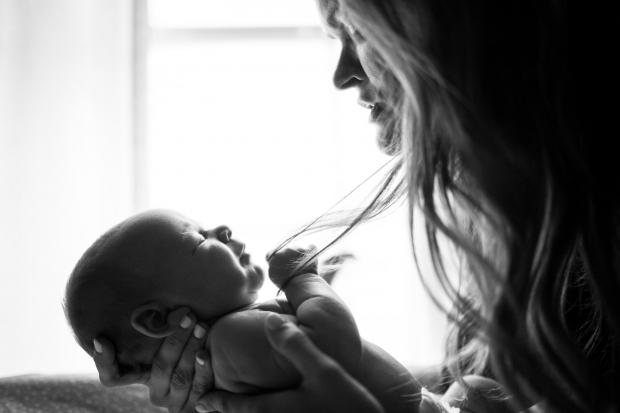 Stock image of mother and baby (Unsplash)