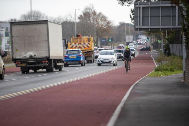 Bournemouth Echo: New cycle lane in Wallisdown Road, A3049. Picture: BNPS