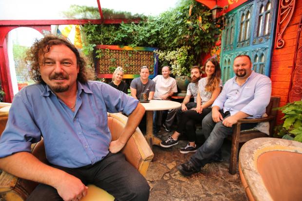 Bournemouth Echo: Harry Seccombe and the team at Chaplins Bar in Boscombe who have been nominated for some awards..
