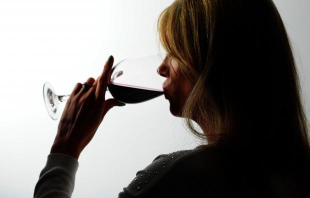 Bournemouth Echo: A woman drinking red wine. Credit: PA