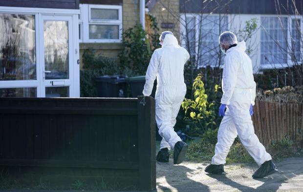 Bournemouth Echo: Crime scene investigators in Heath Road on Wednesday, January 5. Picture: PA