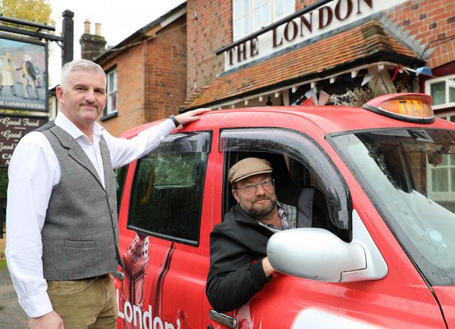 Phil Hoyle, left, landlord of The London Tavern, and Billy Bristow, Ringwood’s first London-style cabbie