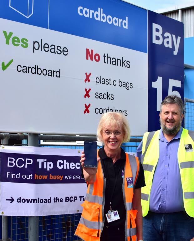 Bournemouth Echo: Angela Harris and Cllr Mark Anderson show off the new app. Picture: BCP Council