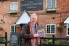 Quiz organiser Anthony Swift outside the Horse and Groom pub at Woodgreen in the New Forest.