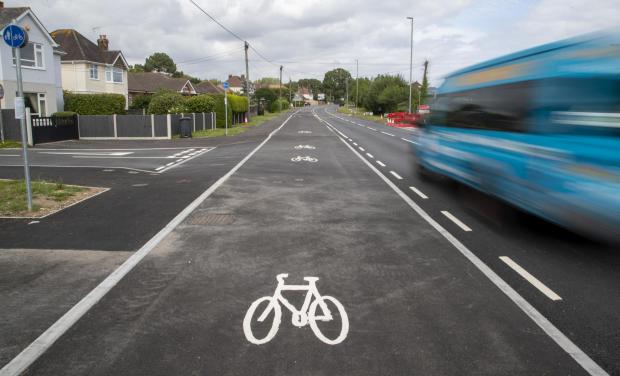 Bournemouth Echo: BNPS.co.uk (01202) 558833. ..Pic: CorinMesser/BNPS....A cycle lane which is believed to be one of Britain's widest has been slammed by road users who are bemused by its size.....Despite measuring over half as wide as the adjacent road, cyclists have