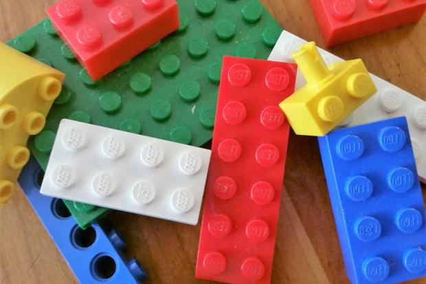 Bournemouth Echo: Multi-coloured LEGO blocks. Credit: Canva