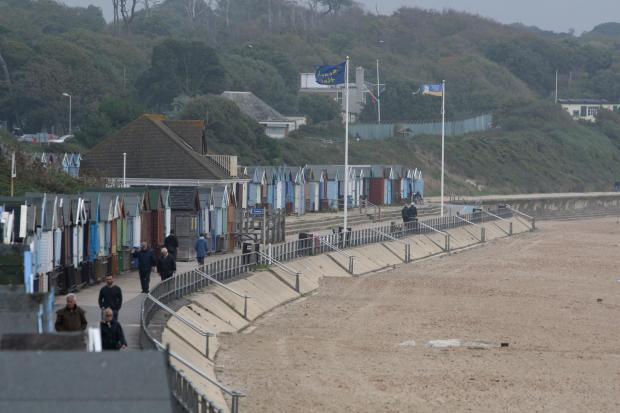 Bournemouth Echo: Beach huts and the Beach Hut Cafe at Friar's Cliff in Christchurch
