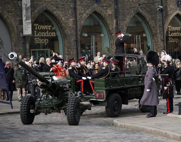 Bournemouth Echo: Members of the Honourable Artillery Company fire a gun salute from the wharf at the Tower of London to mark the official start of the Platinum Jubilee. Picture: PA