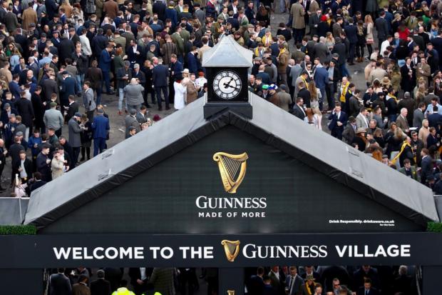 Bournemouth Echo: The Guinness Village is always a popular hang-out at the Cheltenham Festival.(Tim Goode/PA)