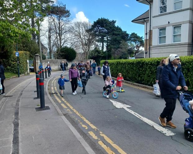 Bournemouth Echo: Parents enjoy road closure scheme in Somerville Road, Bournemouth, outside St Michael's CE Primary School