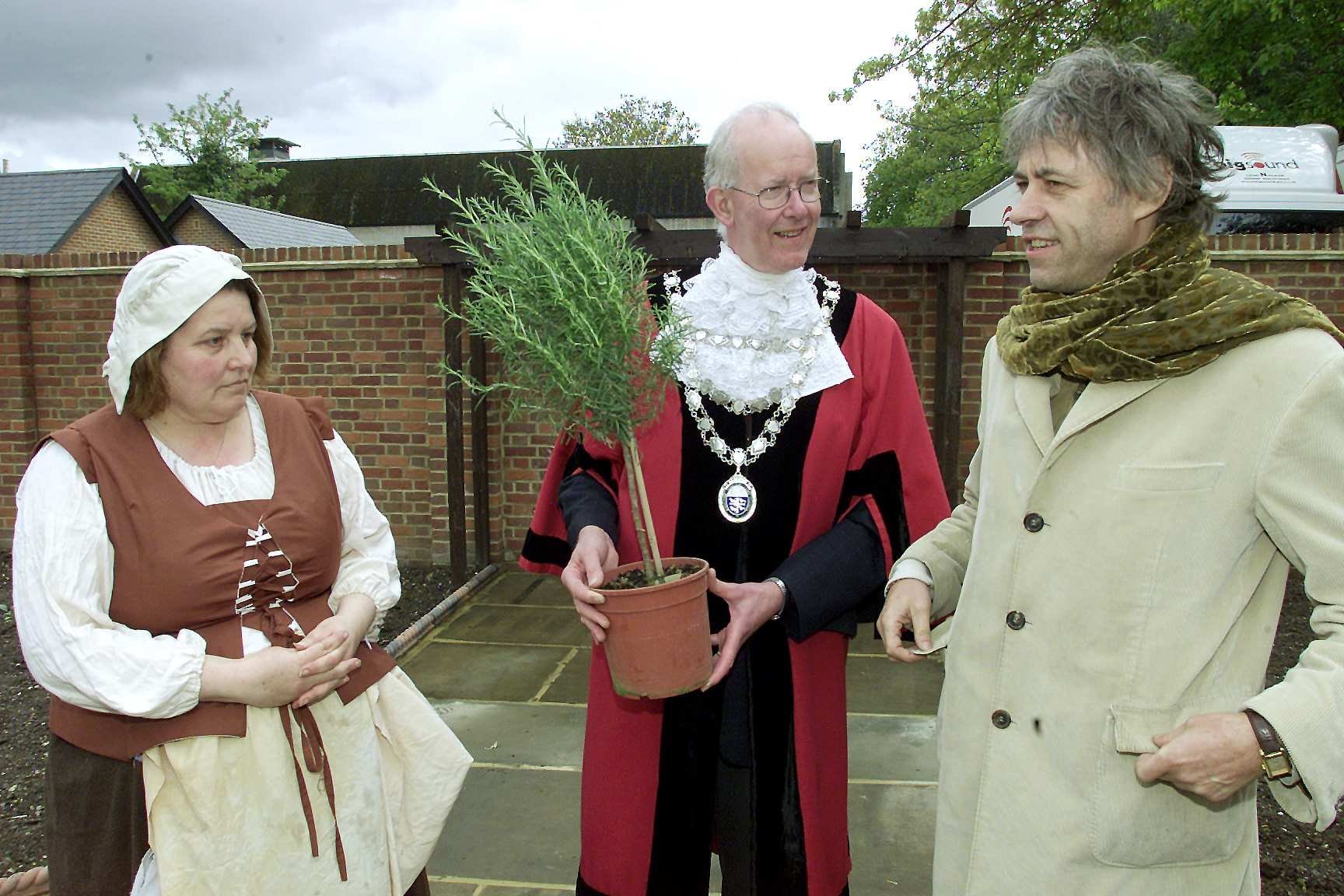 Bob Geldof in Wimborne on the day of his concert at the Tivoli Theatre: Wimborne Mayor Anthony Oliver asks Bob Geldof to plant a rosemary bush in the new Physic garden
